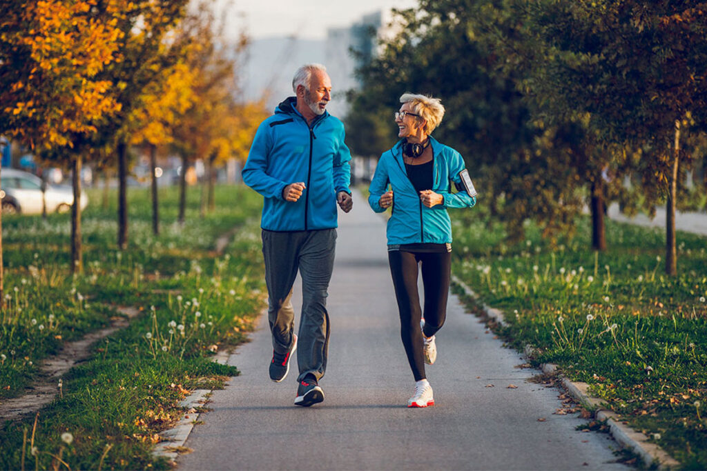 Person sitting in a meditative pose at the end of a yoga session.